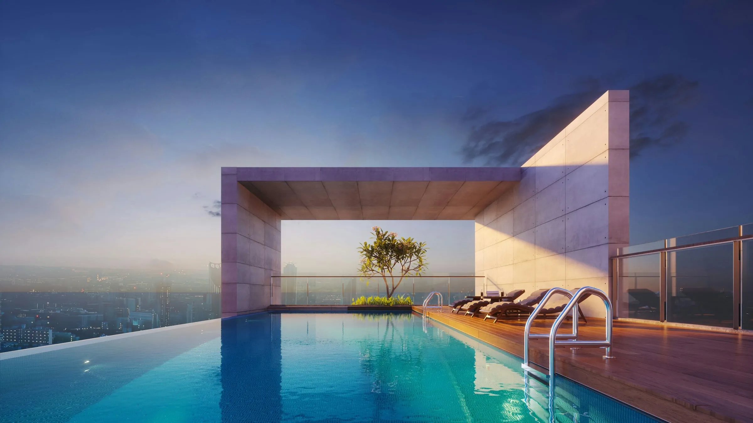 Terraço da Cobertura Itaim com piscina de borda infinita e vista para a cidade ao entardecer